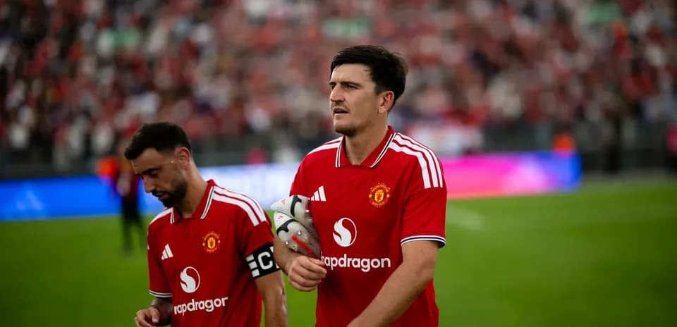 Manchester United players walking off the pitch