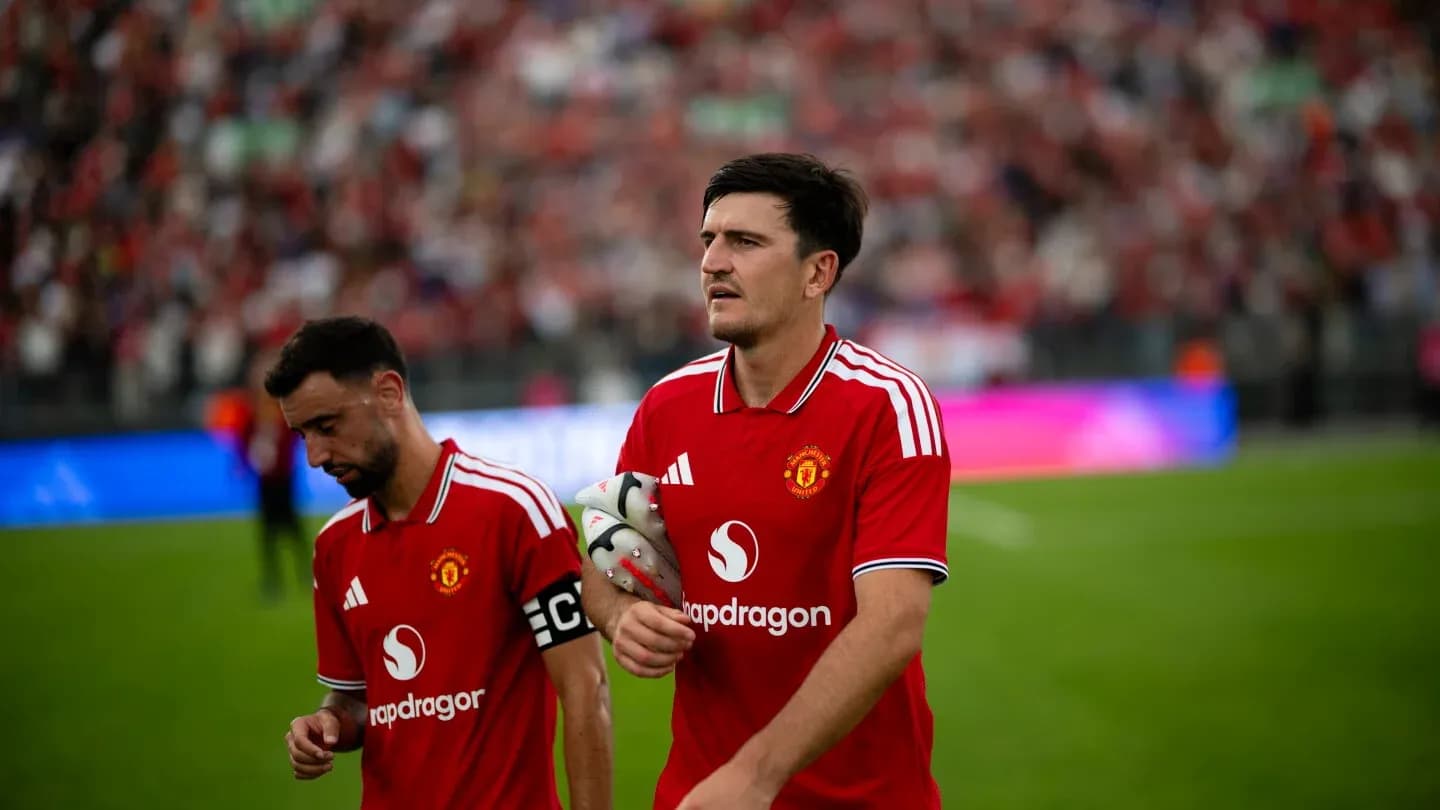 Manchester United players walking off the pitch