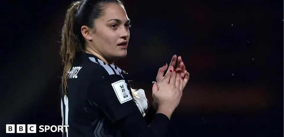 Goalkeeper applauding fans after the match