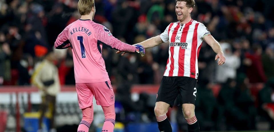 Two players celebrating after a match together