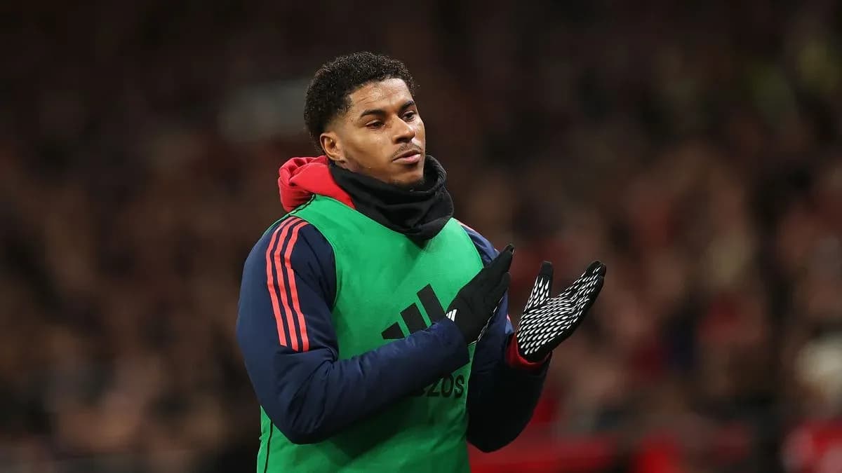 Player applauding from the sidelines during match