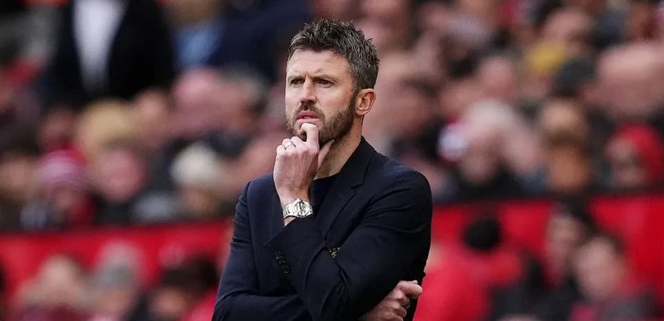 Manager contemplating during a match at stadium