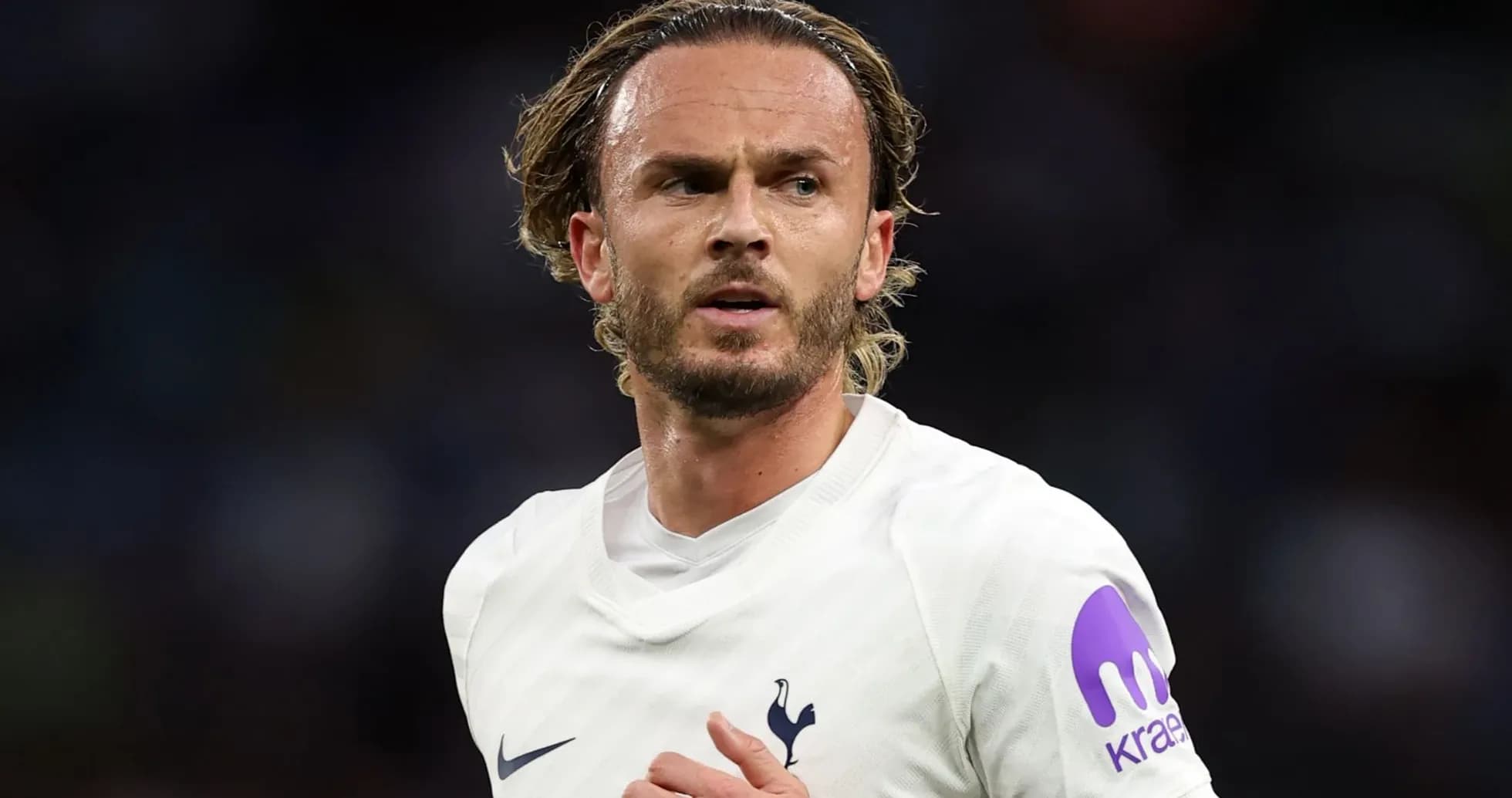 Player in Tottenham jersey during match action