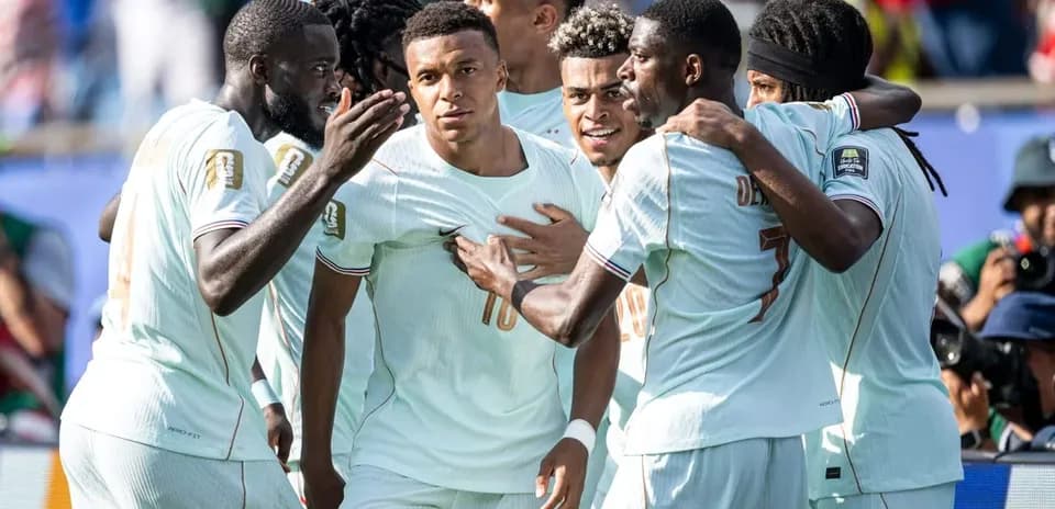 Players celebrating a goal during a match