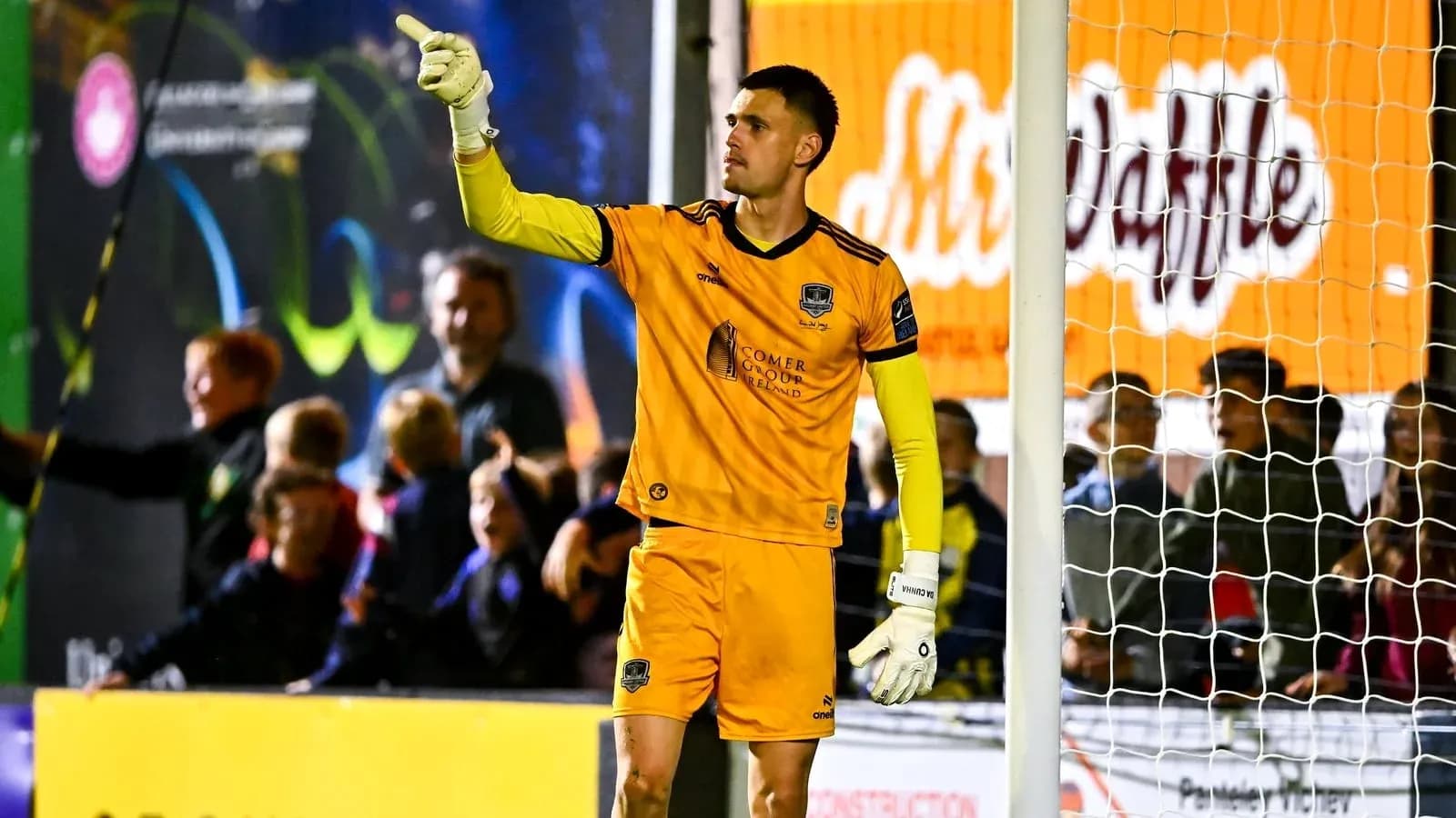 Goalkeeper signaling during a soccer match