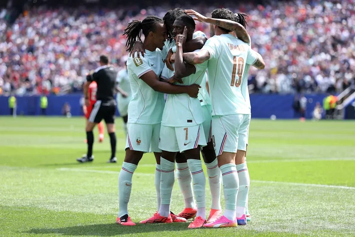 French team celebrating a goal on the field