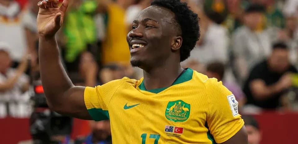 Player celebrating in Australia's yellow jersey during match