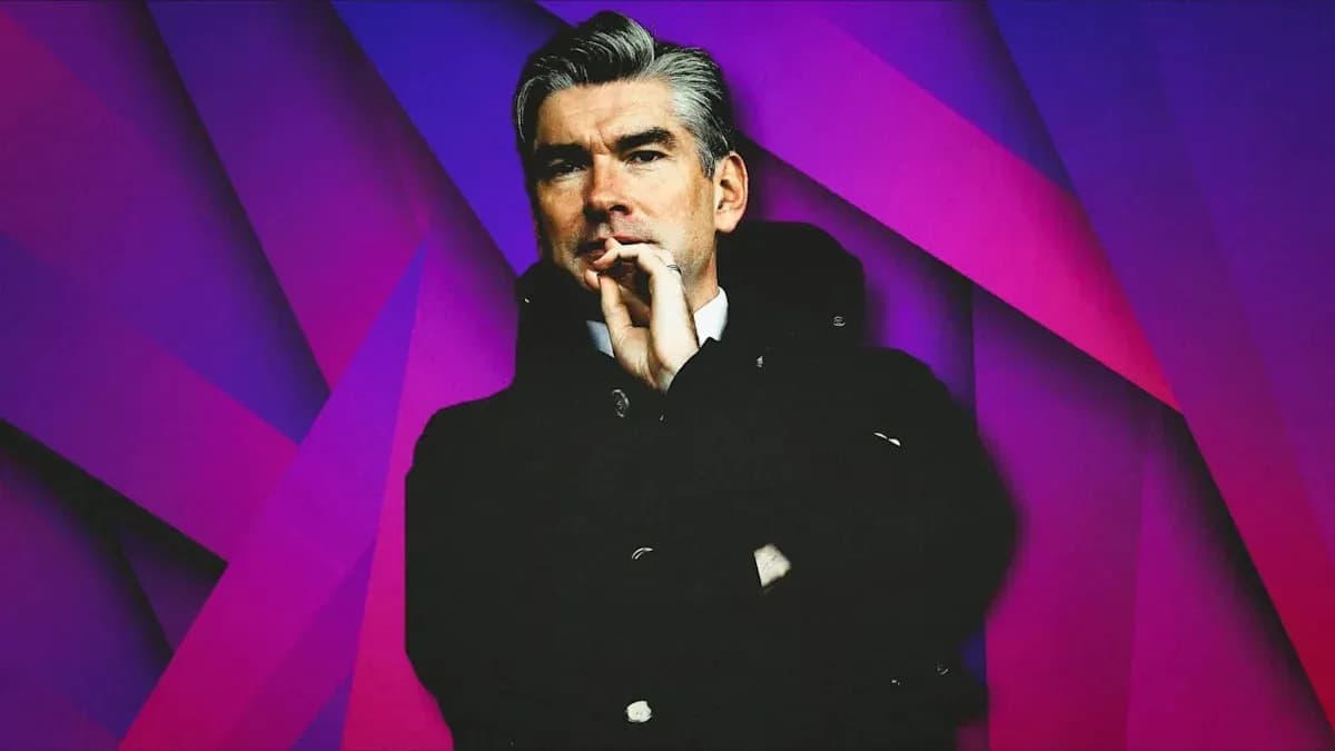 Man in a coat with a thoughtful expression