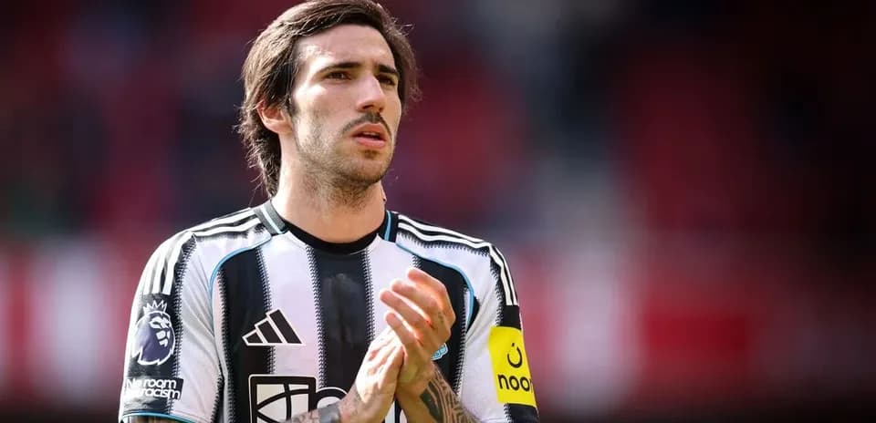 Player applauding fans during a match