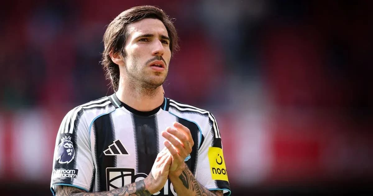 Player applauding fans during a match