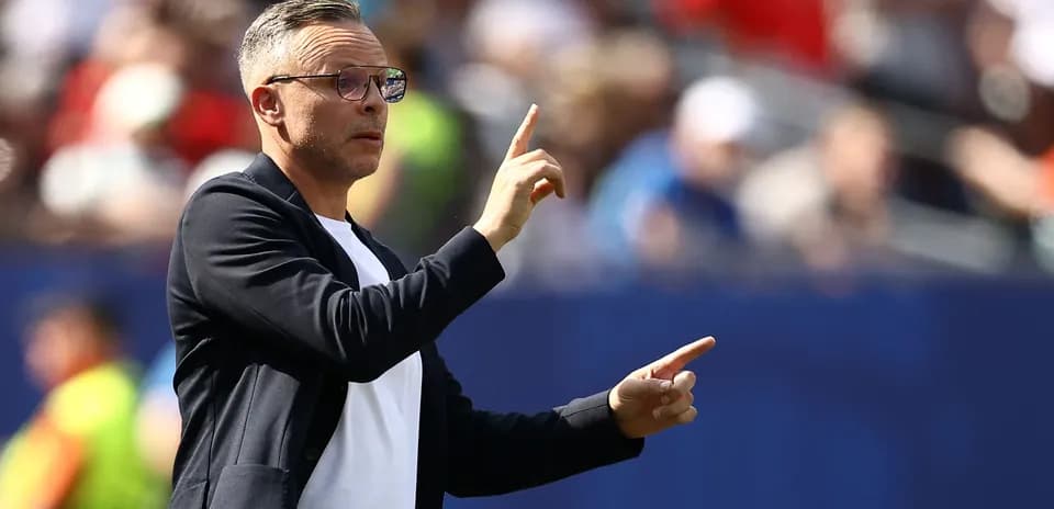 Coach giving instructions during a match