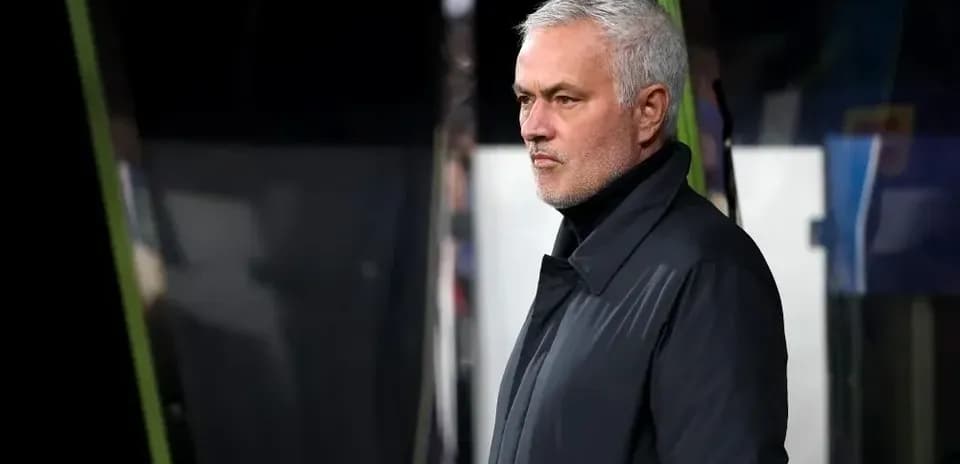 Manager observing match from the sidelines