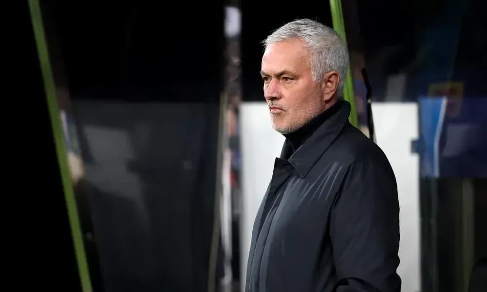 Manager observing match from the sidelines