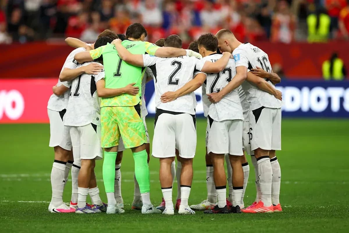 Team huddle before the match on the field