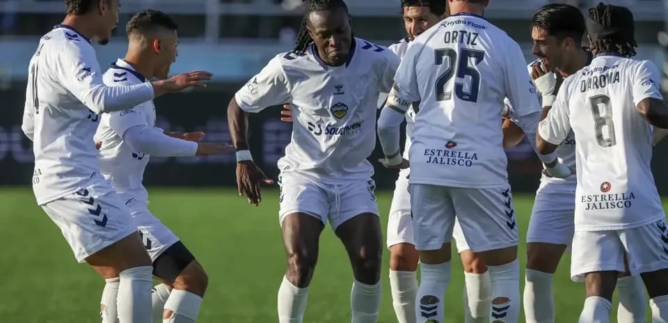 Players celebrating a goal in USL Championship match