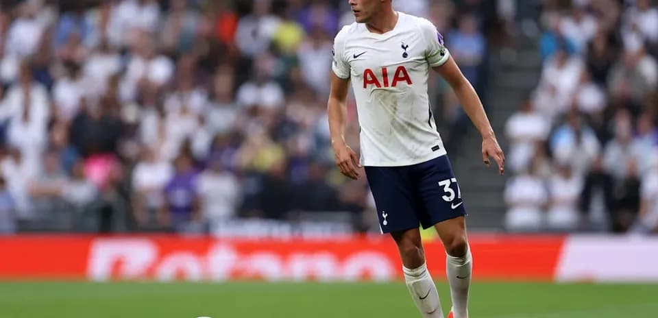 Tottenham player on the field with ball