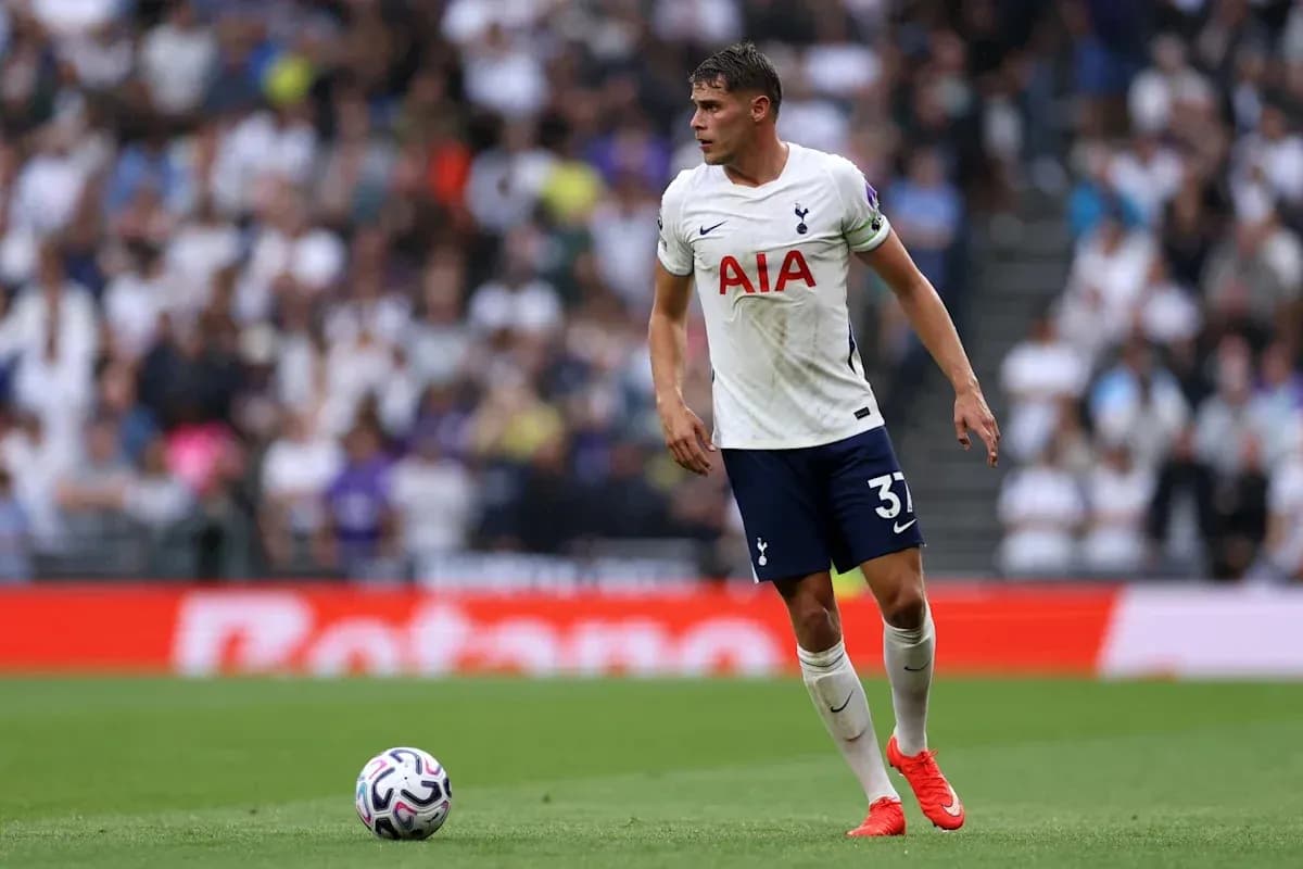 Tottenham player on the field with ball