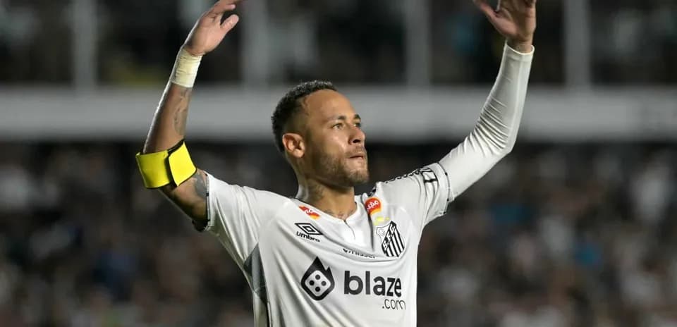 Player celebrating with arms raised during match