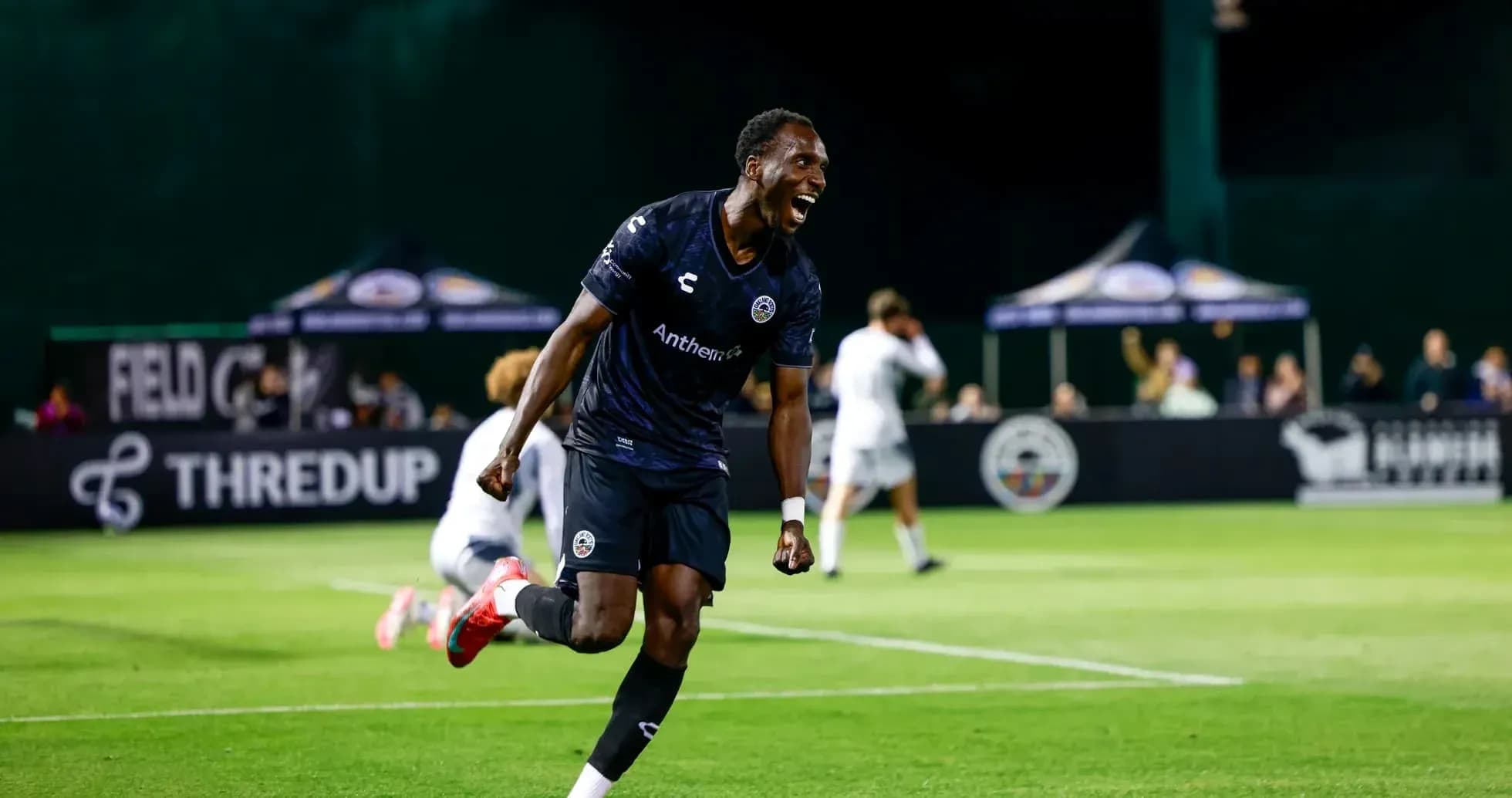 Player celebrating during Loudoun United match