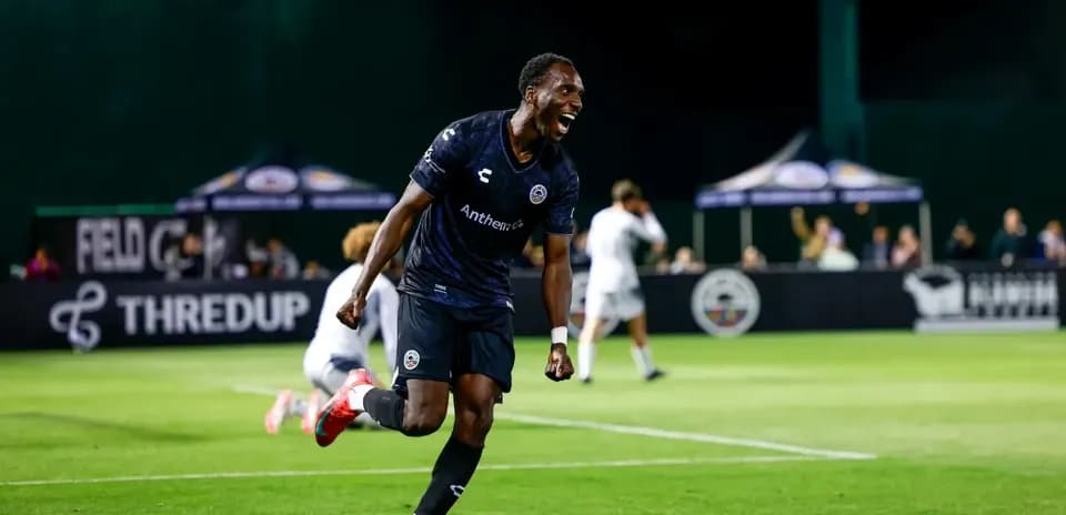 Player celebrating during Loudoun United match