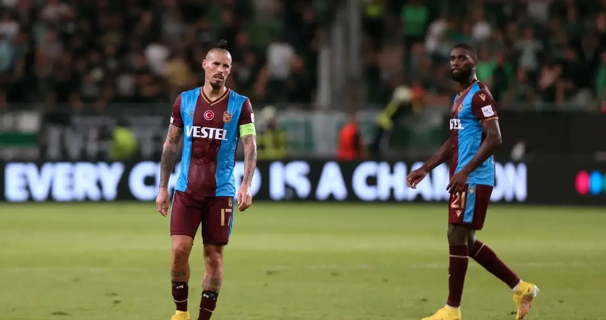 Trabzonspor players walking on the pitch