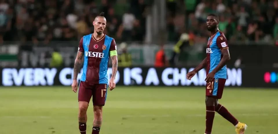 Trabzonspor players walking on the pitch