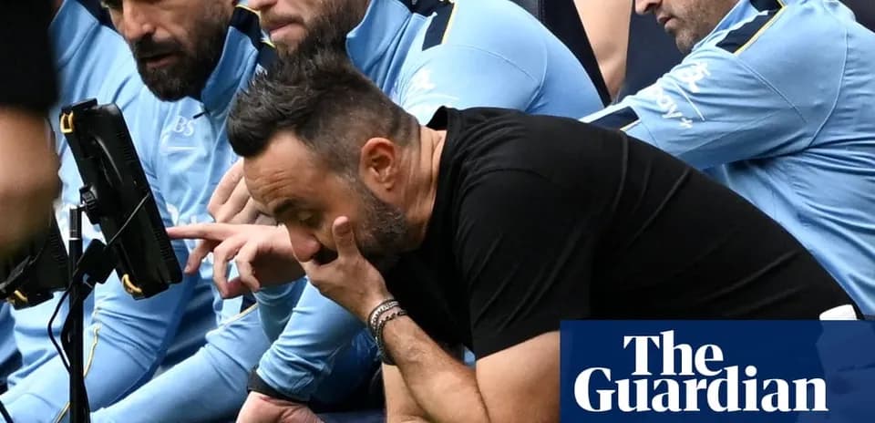 Coaches observing match from the sidelines