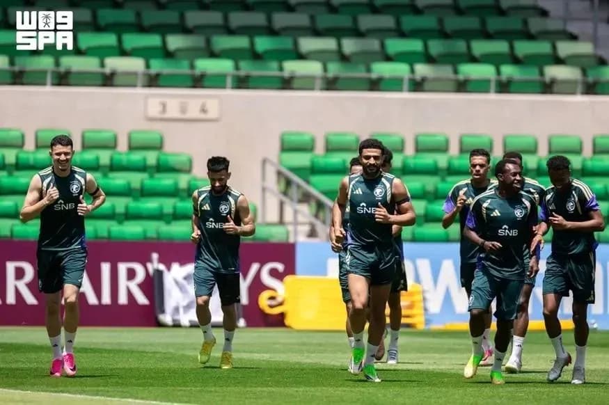 Players jogging during training session on field