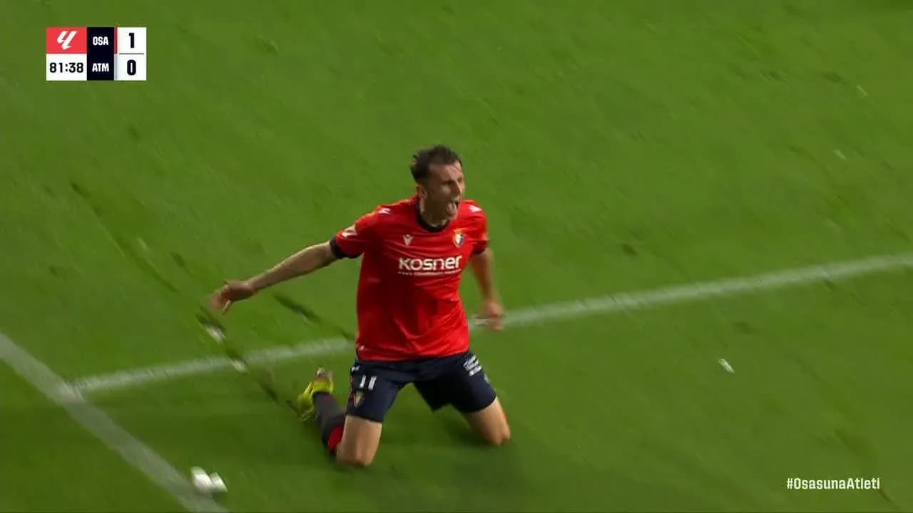 Osasuna player celebrating goal against Atletico Madrid