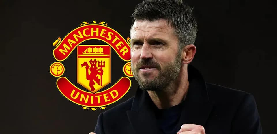 Coach celebrating with Manchester United logo in background