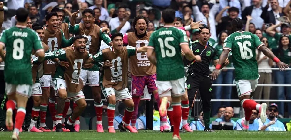 Mexican players celebrating during World Cup match