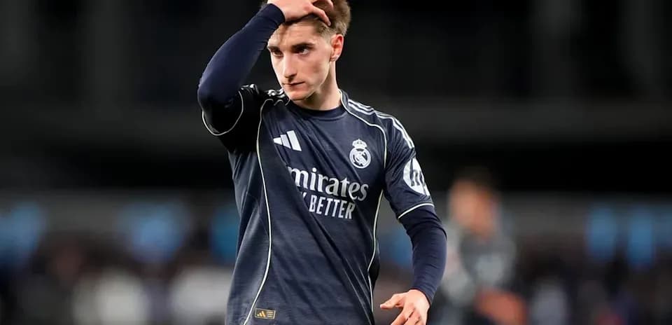 Real Madrid player running hand through hair