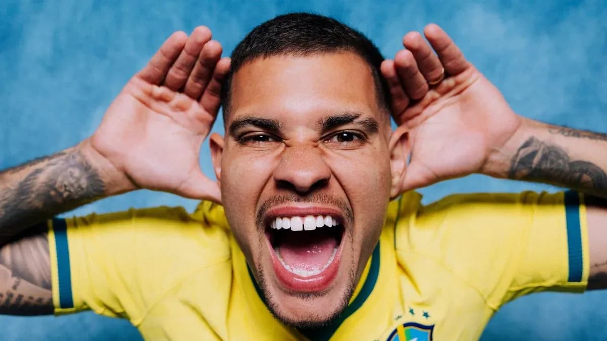 Player in Brazil jersey making a playful expression