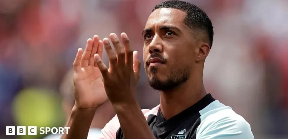 Player applauding fans during match celebration
