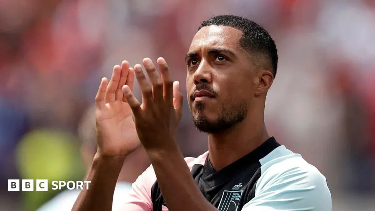 Player applauding fans during match celebration