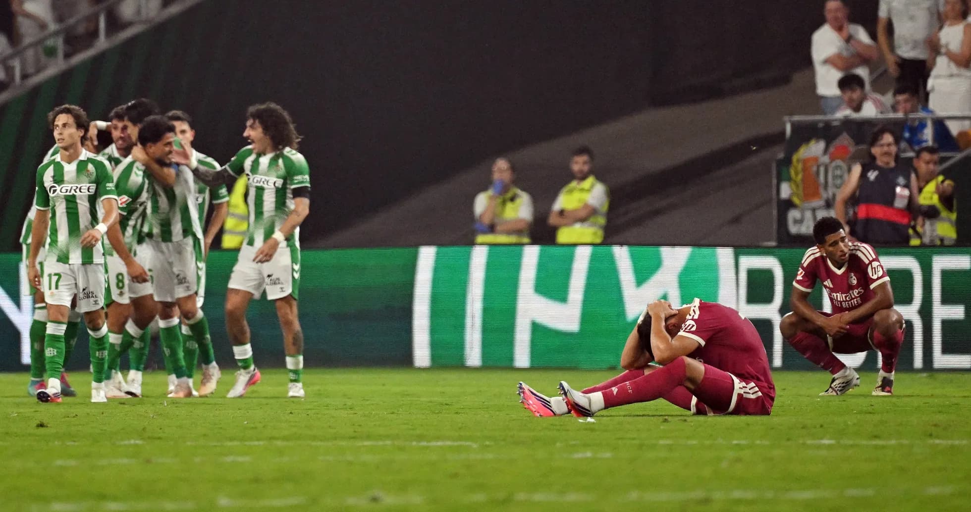 Players reacting after a goal during the match