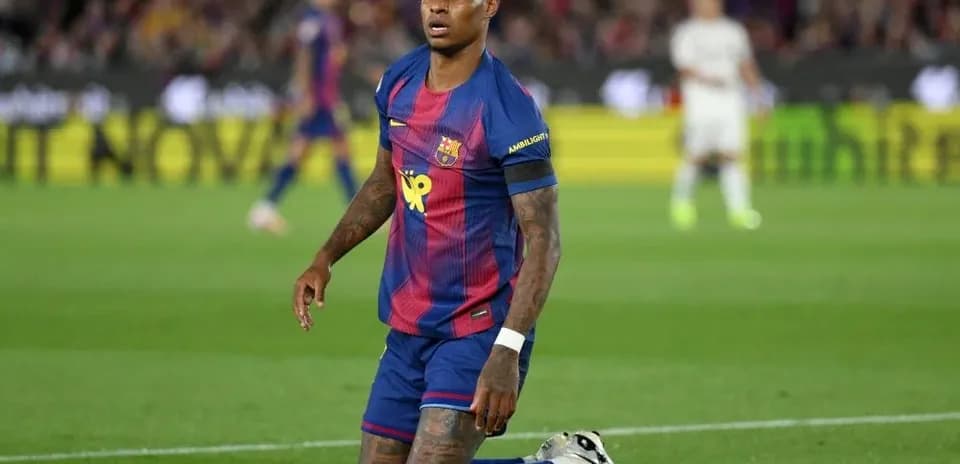 Player kneeling on pitch during match