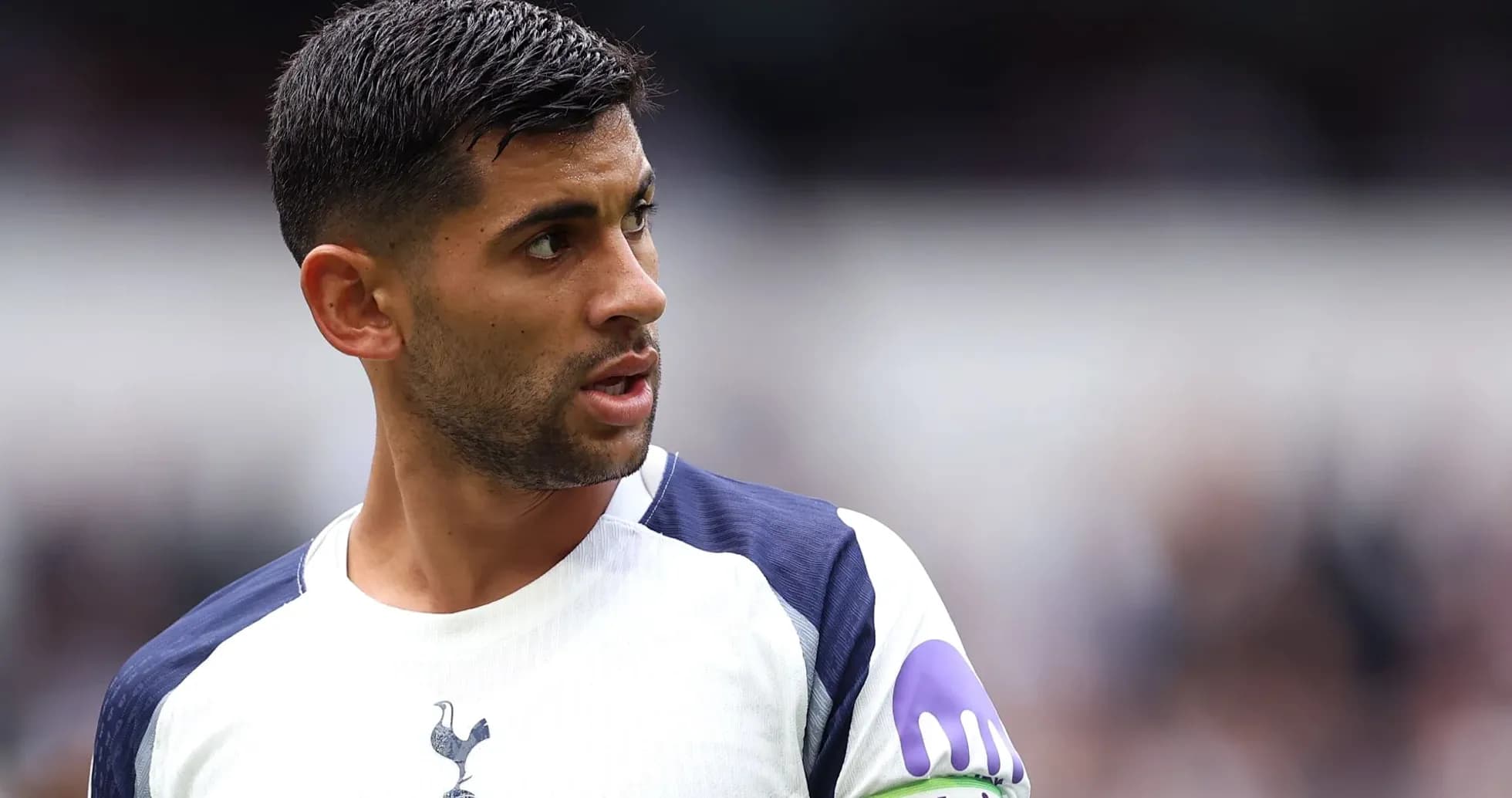 Player in Tottenham kit looking towards the field