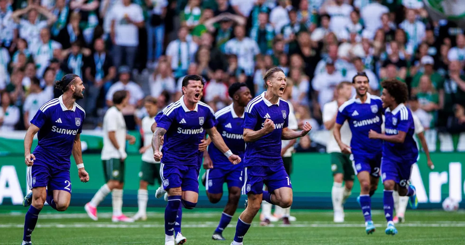 Anderlecht players celebrating a goal during match