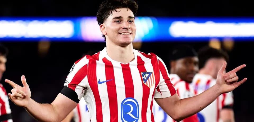 Atletico Madrid player celebrating after scoring goal