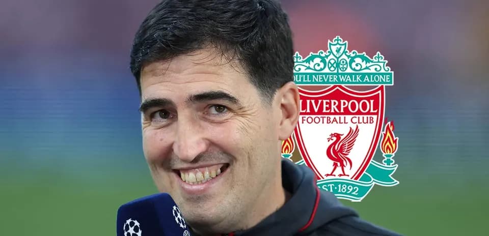 Person speaking into microphone with Liverpool logo behind