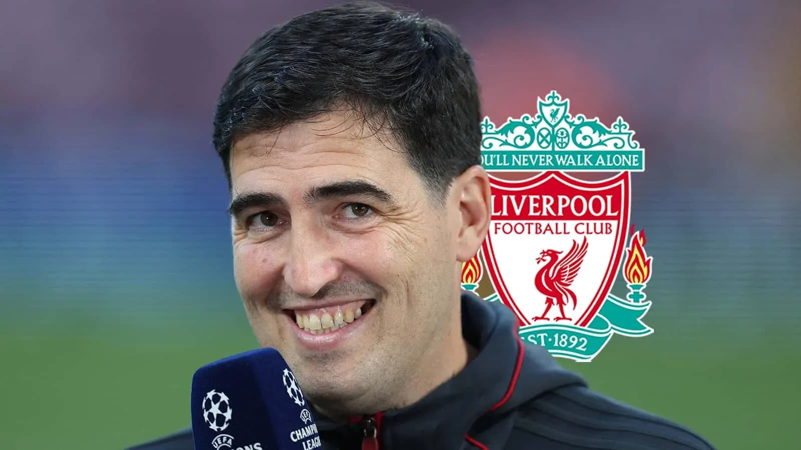 Person speaking into microphone with Liverpool logo behind