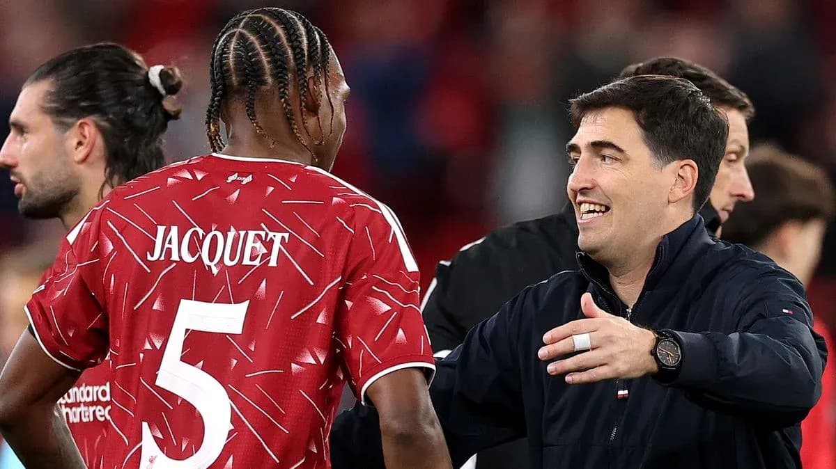 Coach greeting player Jacquet after match