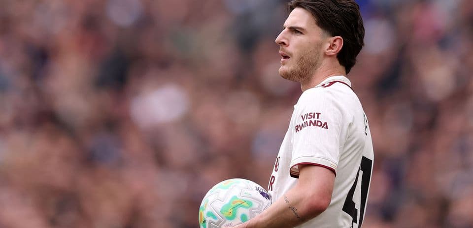 Player holding ball during match on the field