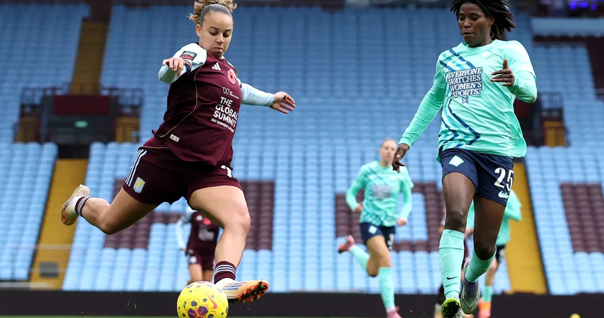 Player kicking the ball during WSL match
