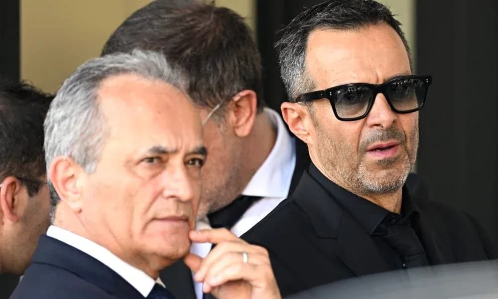 Two men in formal attire at an event