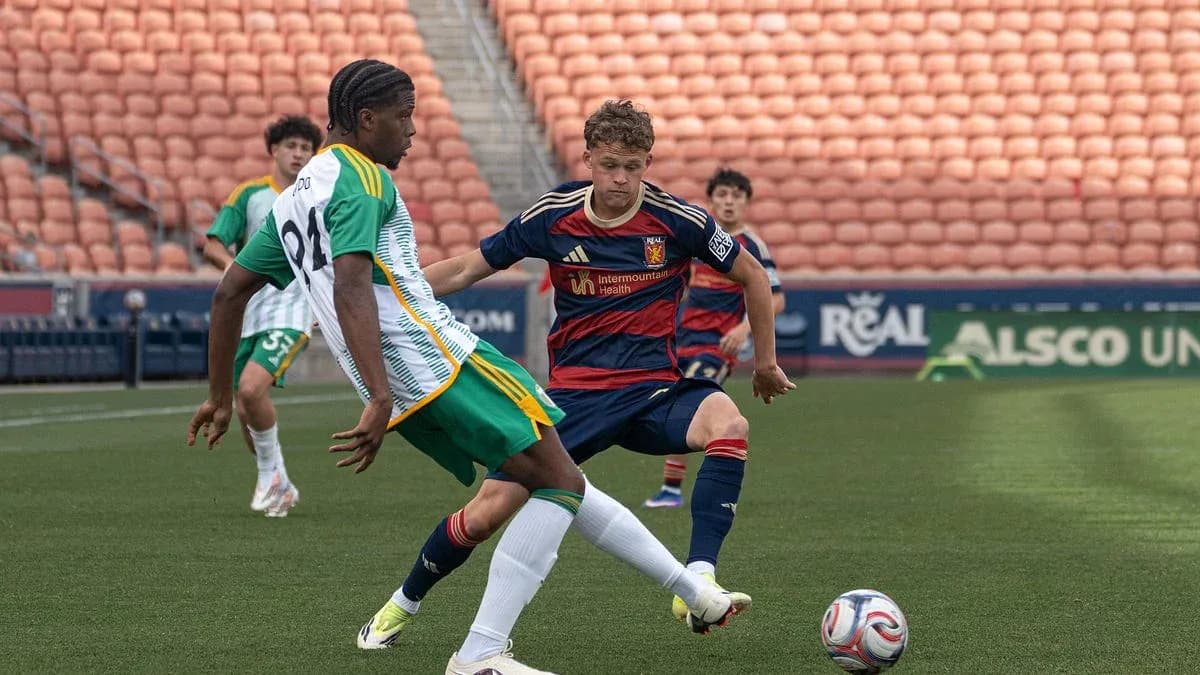 Real Monarchs player tackling Portland Timbers II player