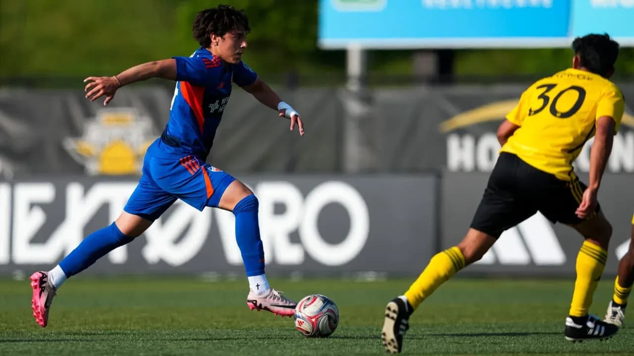 Player dribbling during FC Cincinnati II match