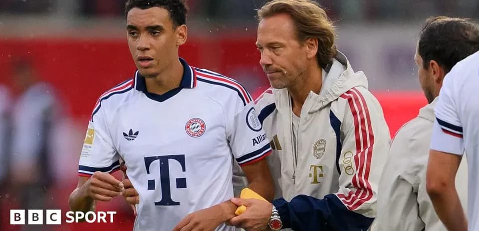 Bayern Munich player interacting with coaching staff