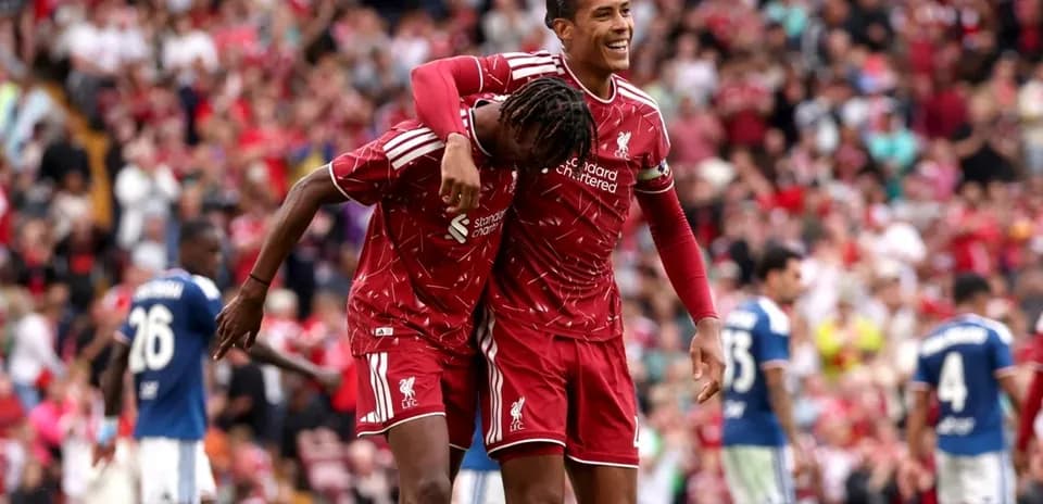 Liverpool players celebrating a goal at Anfield